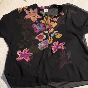 CAbi Black Top with Vibrant Floral Accents